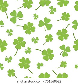 White seamless pattern with green clovers. Vector illustration. EPS 10. Green clovers in simple cartoon style.