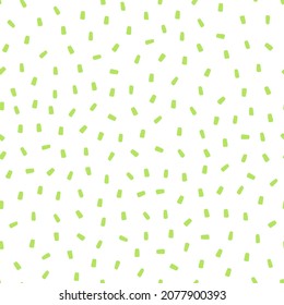 White seamless pattern with green sprinkles background.