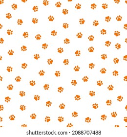 White seamless pattern with orange paws.