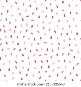 White seamless pattern with pink sprinkles.
