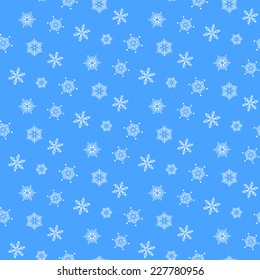 White seamless pattern of snowflakes on a navy blue background