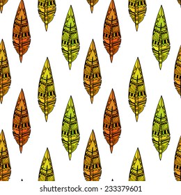White seamless texture with yellow ornaments from bird feathers in tribal style. Vector illustration.