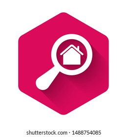 White Search house icon isolated with long shadow. Real estate symbol of a house under magnifying glass. Pink hexagon button. Vector Illustration