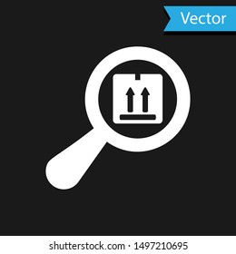 White Search package icon isolated on black background. Parcel tracking symbol. Magnifying glass and cardboard box. Logistic and delivery.  Vector Illustration