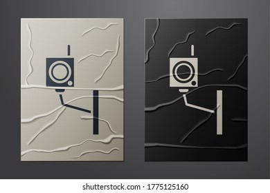 White Security camera icon isolated on crumpled paper background. Paper art style. Vector Illustration