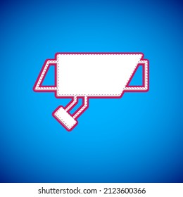 White Security camera icon isolated on blue background.  Vector
