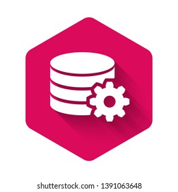 White Setting database server icon isolated with long shadow. Database Center. Pink hexagon button. Vector Illustration
