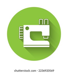 White Sewing machine icon isolated with long shadow. Green circle button. Vector