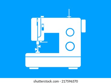 White sewing machine on blue background 