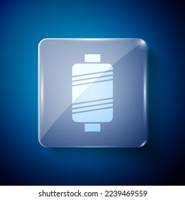 White Sewing thread on spool icon isolated on blue background. Yarn spool. Thread bobbin. Square glass panels. Vector Illustration