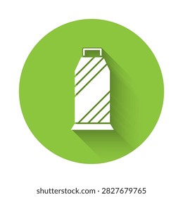 White Sewing thread on spool icon isolated with long shadow. Yarn spool. Thread bobbin. Green circle button. Vector