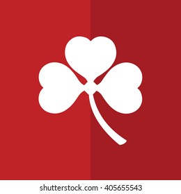 White shamrock icon vector illustration. Red background