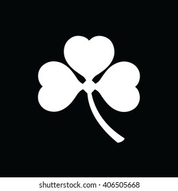 White shamrock icon vector illustration. Black background