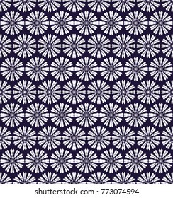 the white shapes (snowflakes) form a seamless pattern on an ultra-violet background
