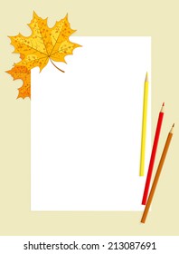 White sheet for drawing, three colored pencils and maple leaves