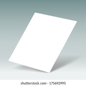 white sheet of paper on a gray background