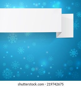White sheets of paper on a  Christmas background. 