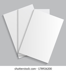 white sheets of paper on a gray background. eps10