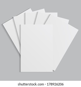 white sheets of paper on a gray background. eps10