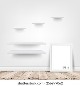 white shelves and blank frame in room