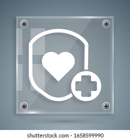 White Shield and heart rate icon isolated on grey background. Health protection concept. Health care. Square glass panels. Vector Illustration