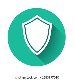 White Shield icon isolated with long shadow. Guard sign. Green circle button. Vector Illustration