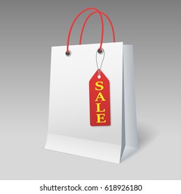 white shopping paper bag on white background with sale badge