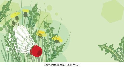 White shuttlecock; and dandelions composition with copy space