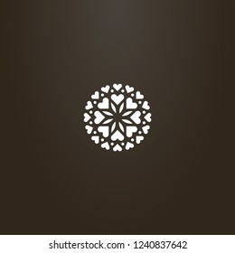 white sign on a black background. vector flat art sign of a round flower of hearts and petals