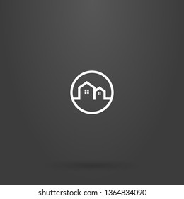 white sign on a black background. simple line art sign of two private houses in a round frame
