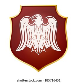 White silhouette of an eagle on a red shield