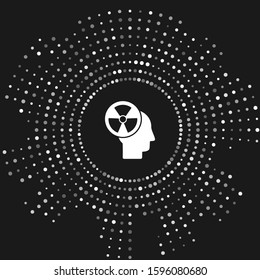 White Silhouette of a human head and a radiation symbol icon isolated on grey background. Abstract circle random dots. Vector Illustration