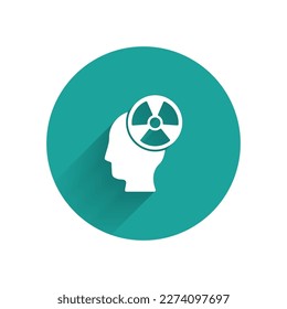 White Silhouette of a human head and a radiation symbol icon isolated with long shadow. Green circle button. Vector