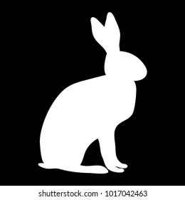 White silhouette on a black background of a domestic rabbit or a wild hare in a sitting position. Ears, paws, tail, head and trunk are visible