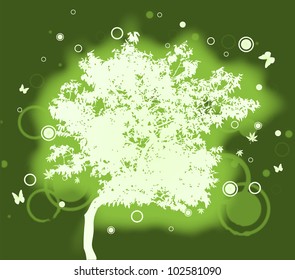 White silhouette of tree on green background
