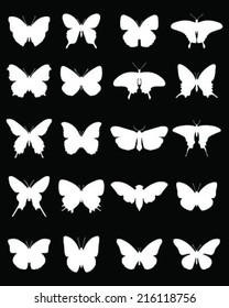 White silhouettes of butterflies on a black background 2, vector