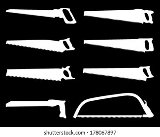 White silhouettes of handsaw on a black background, vector