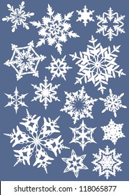 "white silhouettes of snowflakes on a colored background 2"