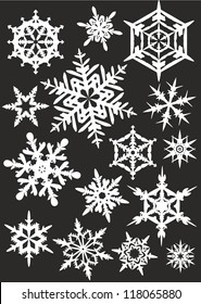 "white silhouettes of snowflakes on a colored background 3"