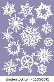 "white silhouettes of snowflakes on a colored background 5"
