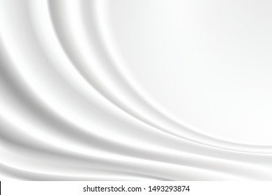 white silk cloth fabric wave overlapping with light and shadow. white and gray abstract texture background and copy space for web design