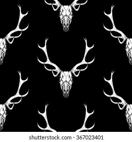 White skull on a black background.Vector seamless pattern