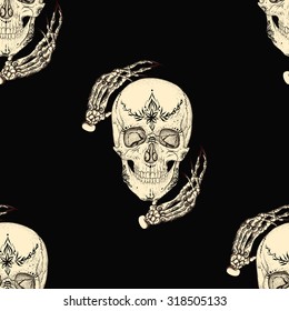 White skull with ornament on black background.Seamless pattern background.