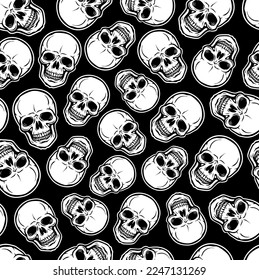 White skulls on a black background. Seamless pattern.