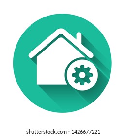 White Smart home settings icon isolated with long shadow. Remote control. Green circle button. Vector Illustration
