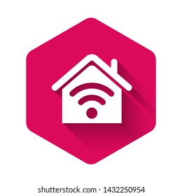 White Smart home with wi-fi icon isolated with long shadow. Remote control. Pink hexagon button. Vector Illustration