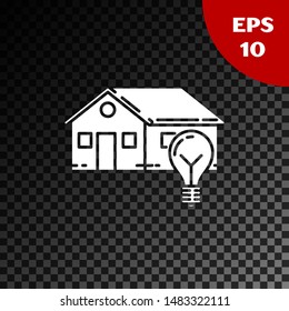 White Smart house and light bulb icon isolated on transparent dark background.  Vector Illustration