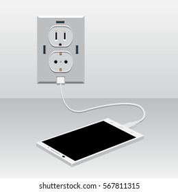 White smartphone charging from usb outlet on light background. Mobile phone charge