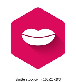 White Smiling lips icon isolated with long shadow. Smile symbol. Pink hexagon button. Vector Illustration