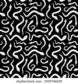 White snakes on black background seamless pattern. Vector hand drawn grunge style illustration icon. Different monochrome snakes seamless pattern